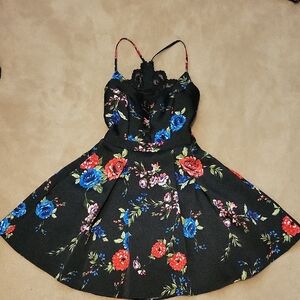B. Smart Black Dress with Floral Accents
